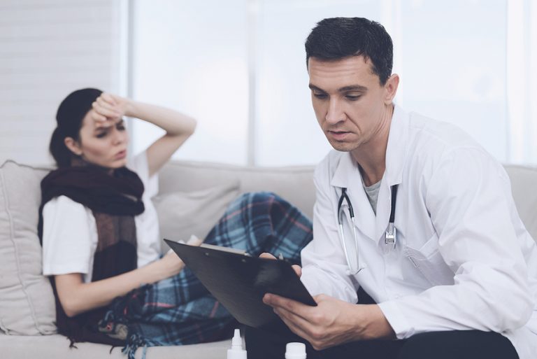 Brisbane home doctor visiting a female patient