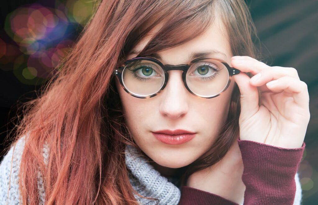 Woman wearing round eyeglasses bought online